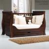 Luxuriöses Babybett umbaubar zum Jugendbett und Stilsofa von TRAMA